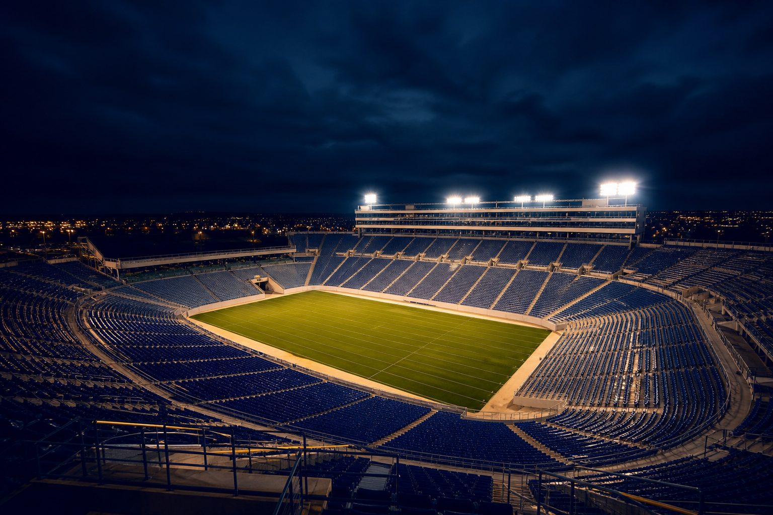 Lit football stadium at night